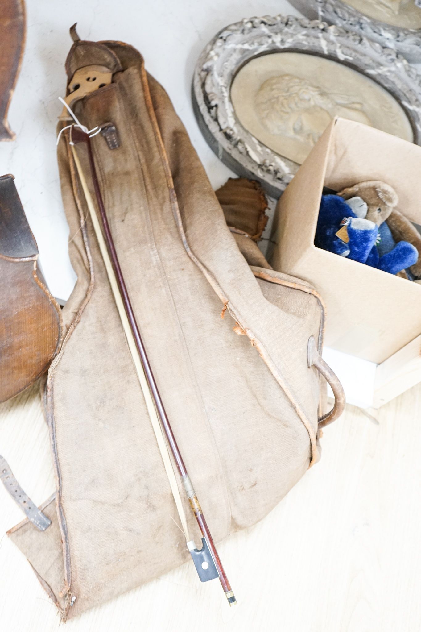 A late 19th century French cello, lob 75.5cm, canvas case with bow